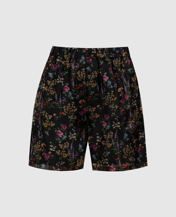 Black NORDICA shorts made of silk with a floral print