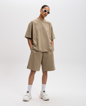 Vetements Бежевые шорты с логотипом UA66SS600Tw