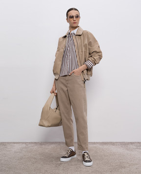 Brunello Cucinelli Бежевые джинсы с кожаным патчем логотипа MB057P5319
