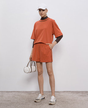 Brunello Cucinelli Оранжевые шорты с цепочкой мониль MPT81EO399
