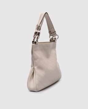 Gucci Бежевая кожаная сумка с фактурным логотипом 7515181AAOW