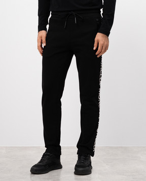 Moncler Черные спортивные брюки с брендированной тесьмой J20918H00019V8183