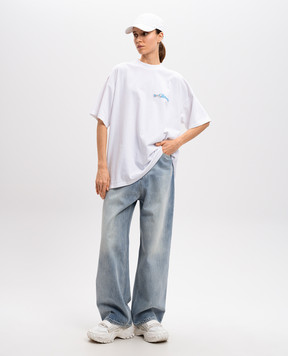Vetements Голубые джинсы с эффектом потертости UA66PA540L