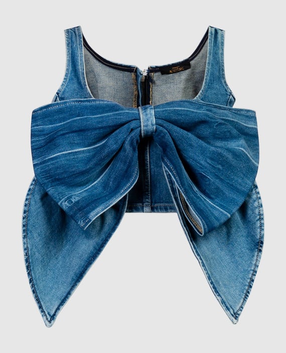 Blue denim top with a bow
