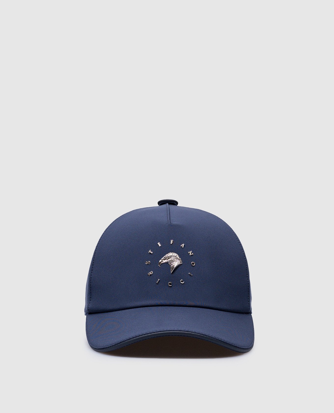 Blue cap with metal logo