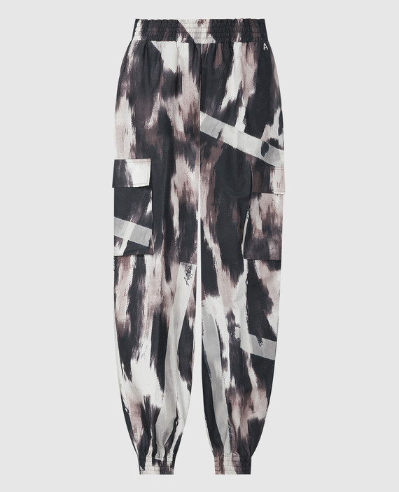 Joggers in a print with a metallic logo