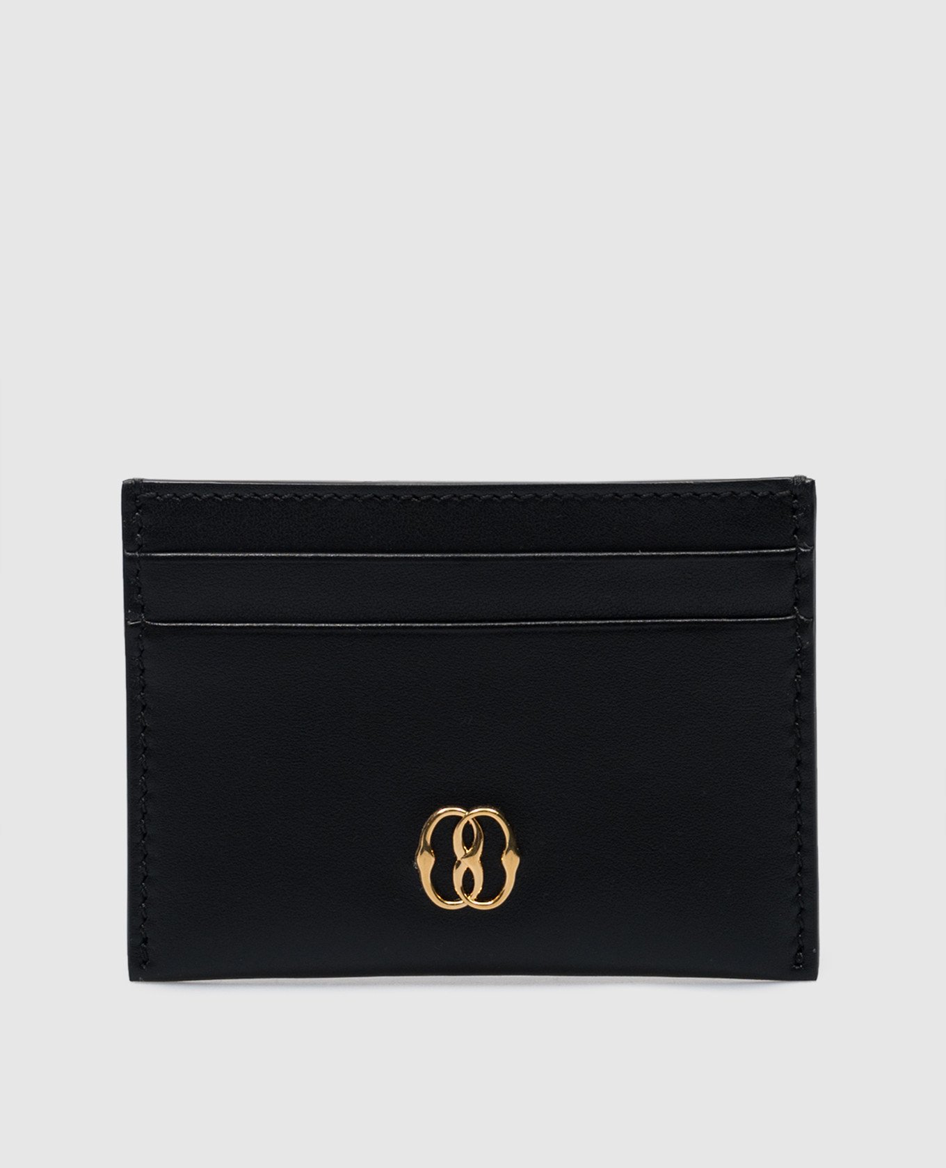 Black leather card holder with metal logo