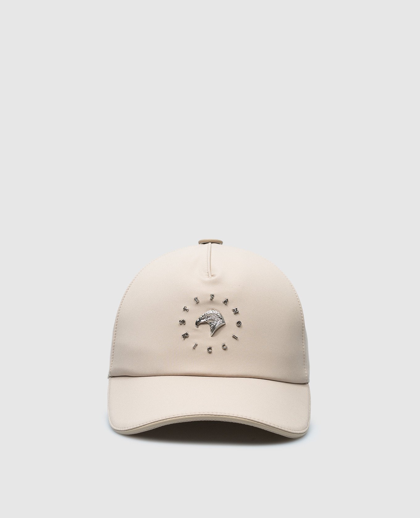 Beige cap with metal logo