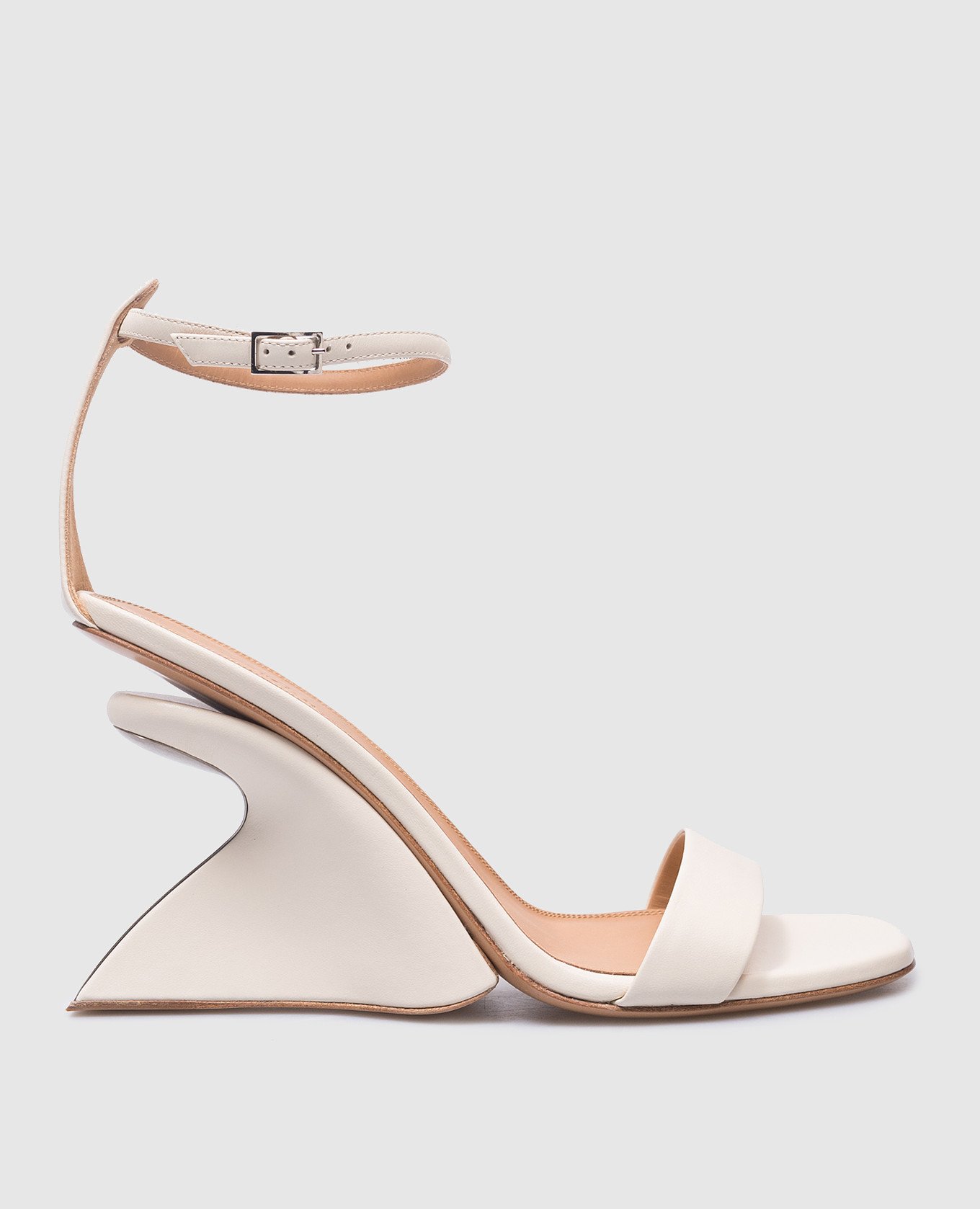 Jug beige leather sandals with curved heels