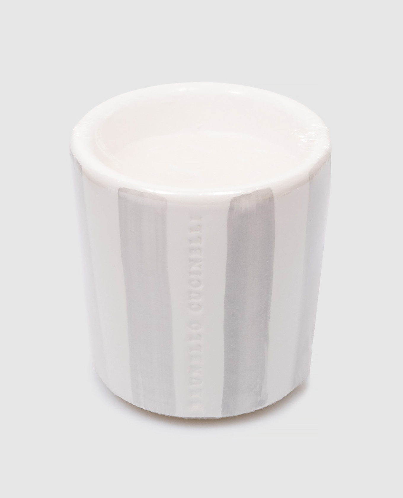 Scented candle in a gray striped ceramic candle holder with a logo