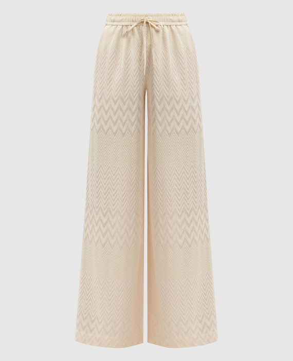 Beige pants in a woven pattern