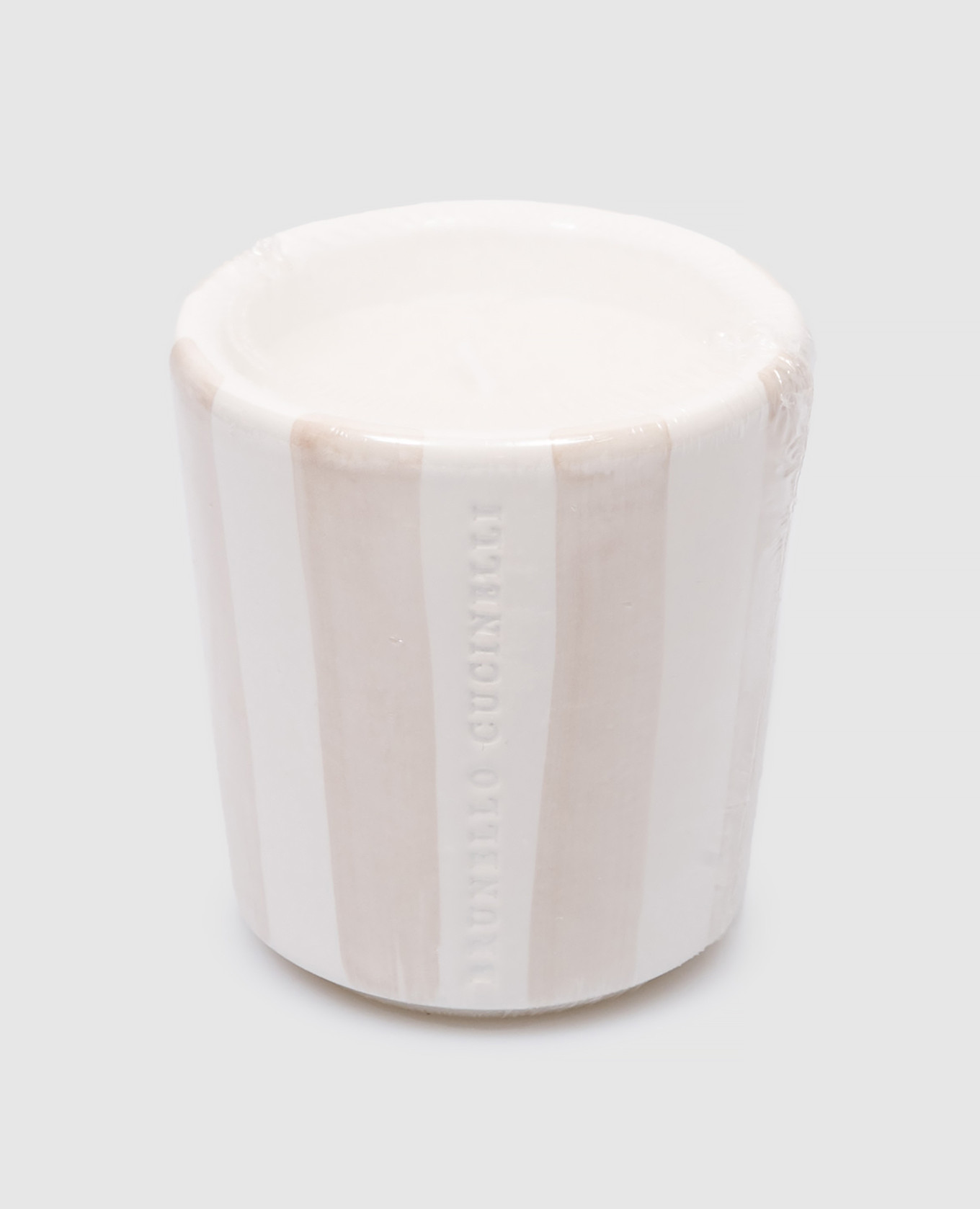 Scented candle in a ceramic candle holder in a beige stripe with a logo