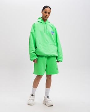 Vetements Зелені шорти з принтом логотипа UA66SS600Ew