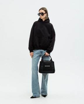 Balenciaga Голубые джинсы клеш с эффектом потертости с патчем логотипа 794047TDW14