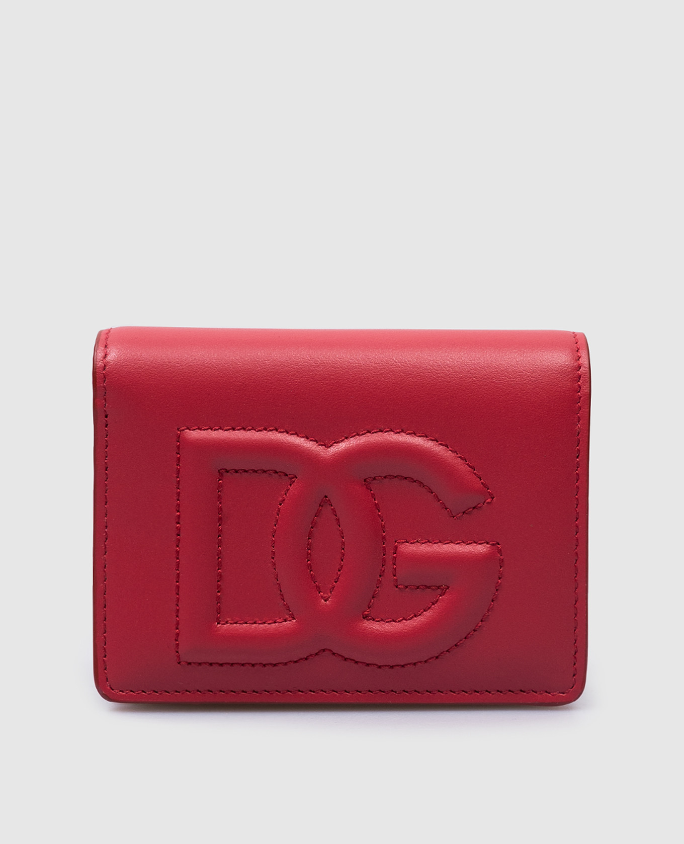 Red leather purse with textured logo