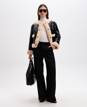 Gucci Черная дубленка с эффектом жатки 16588Y