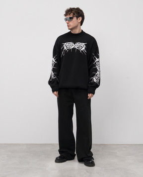 Vetements Чорний светр з вовною меріноса з контрастним принтом UA66KN100BW