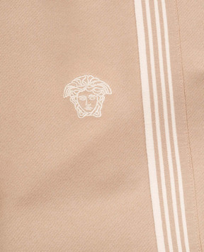 Versace Дитячі бежеві джогери Greca 10182901A11652