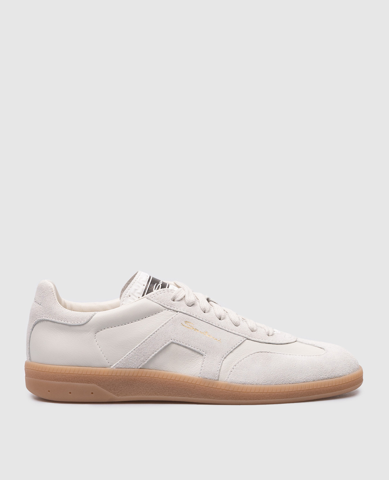 White leather sneakers with embossed logo