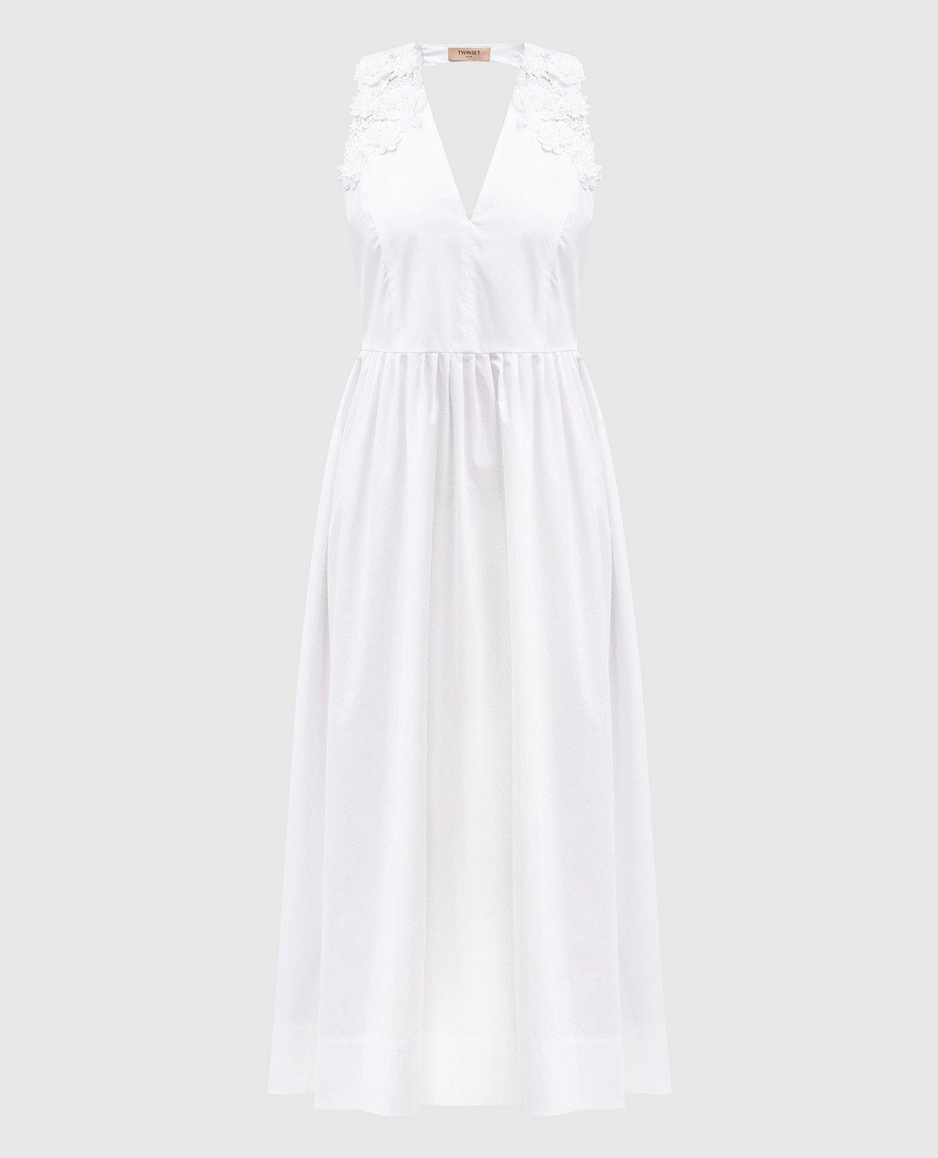 Белое платье миди с кружевом в виде цветов