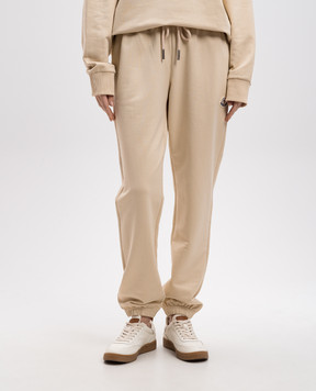 Moncler Бежевые джогеры с нашивкой логотипа J20938H0001089A1K
