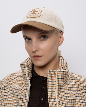 Moncler Бежева кепка з брендованою аплікацією K20933B000180U082