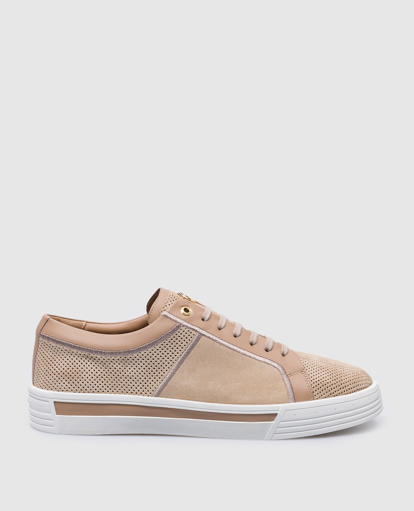 Beige suede sneakers with perforations