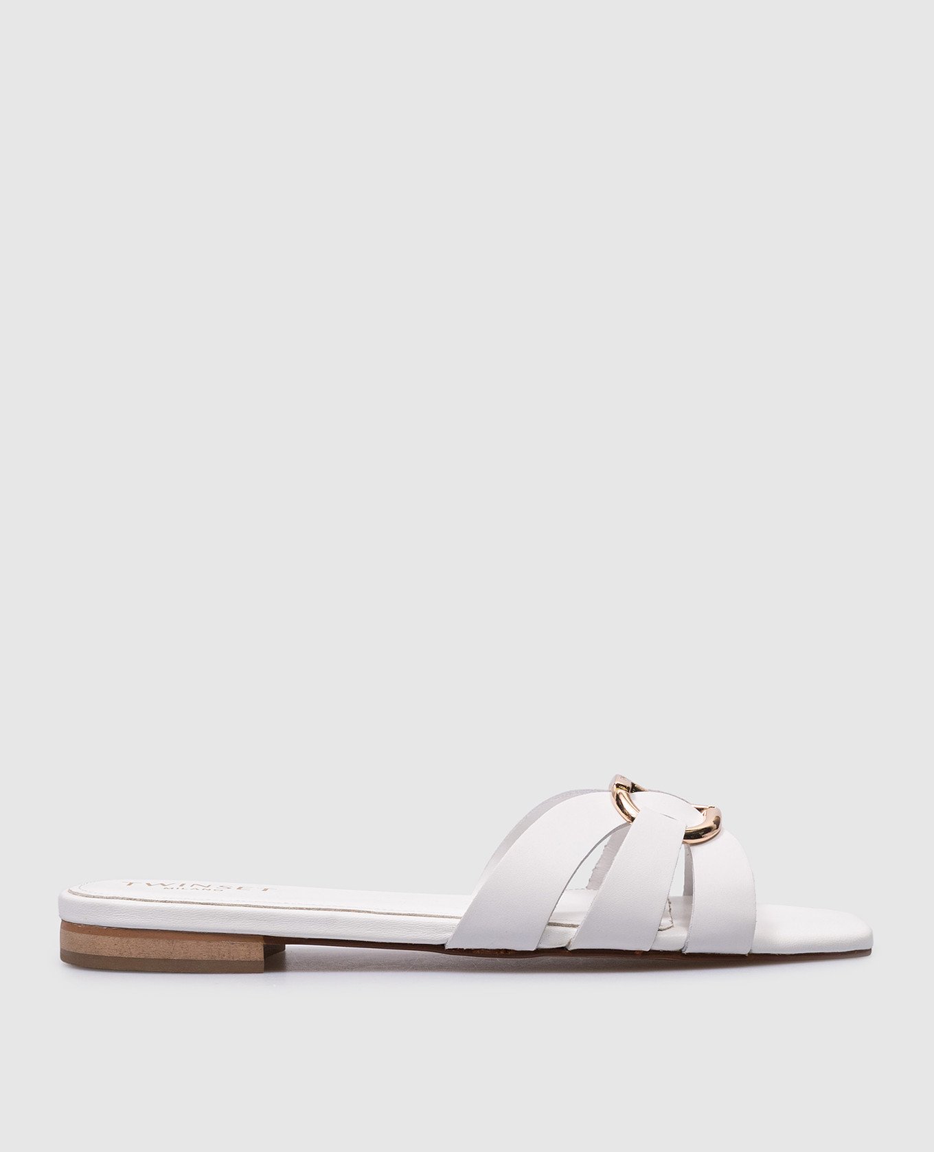 White leather flip flops with metallic Oval-T logo