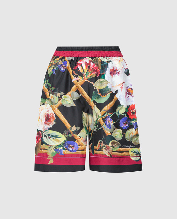 Black shorts made of silk with a floral print