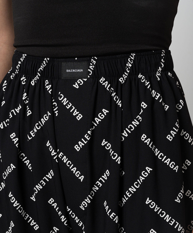 Balenciaga Чорні штани з контрастним принтом логотипа 659026TPLA5 зображення 5