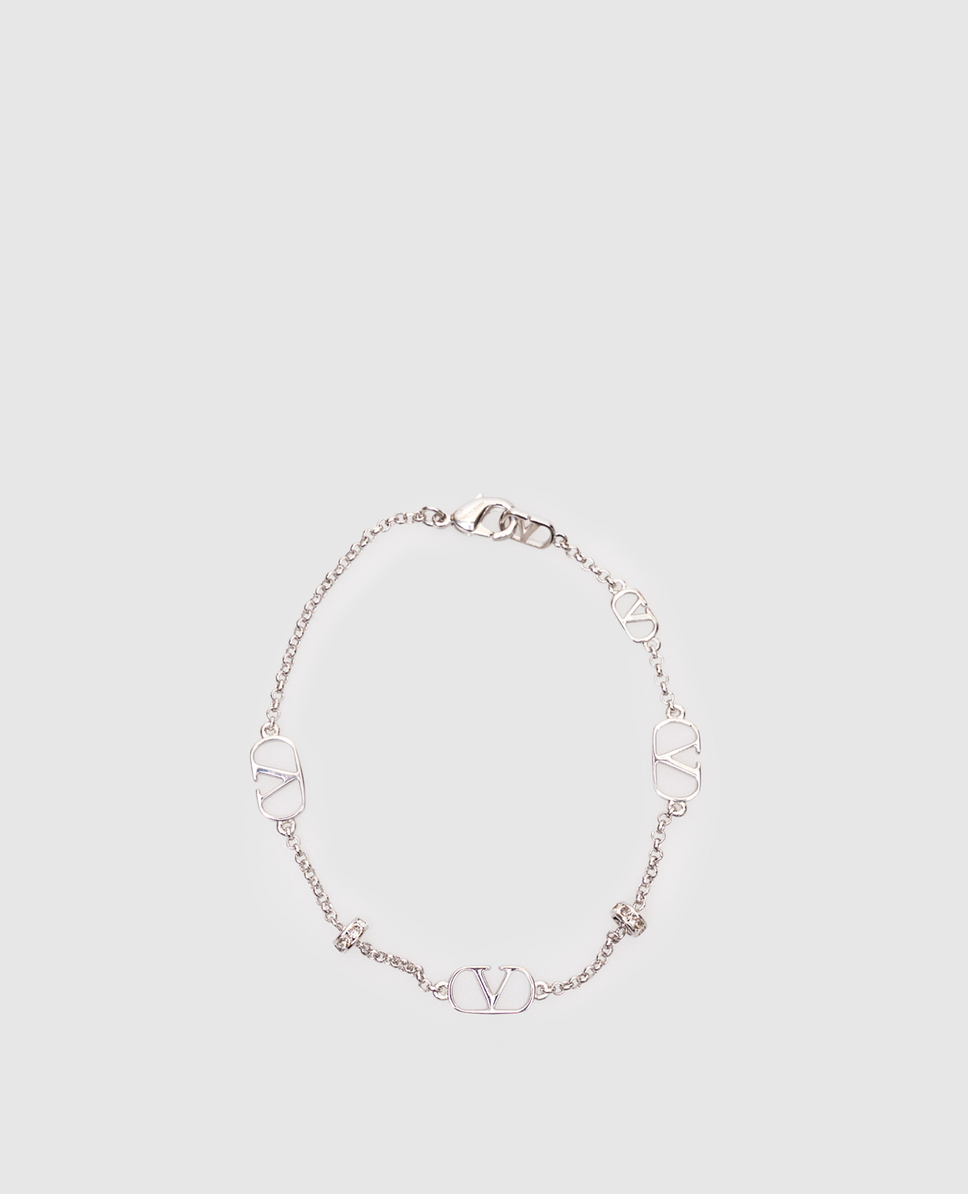 

Серебристый браслет с металлической эмблемой VLogo Signature и кристаллами, Браслеты