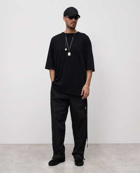 Ann Demeulemeester Черная футболка с брендовым принтом. B0012880FA206