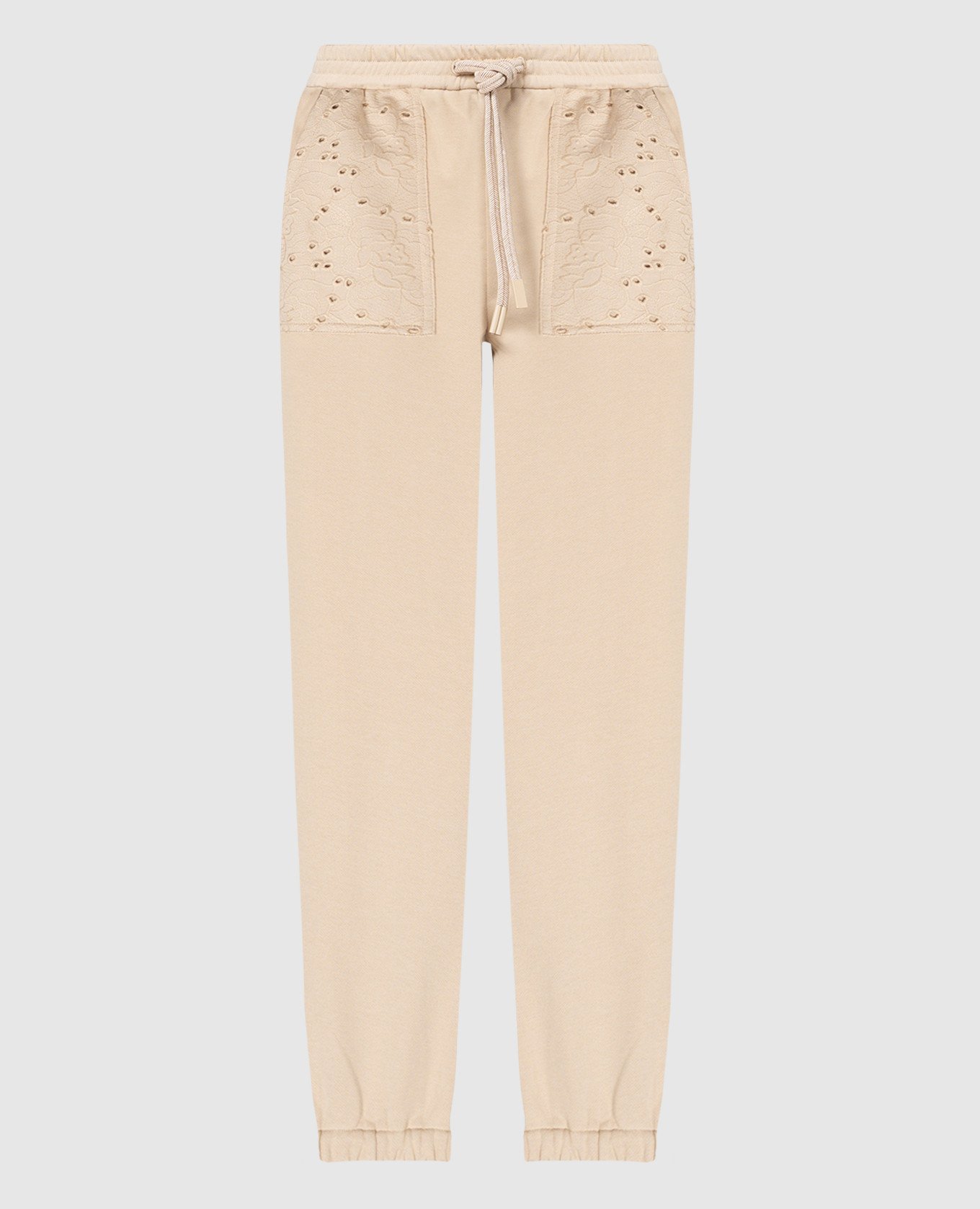 Beige joggers with embroidery