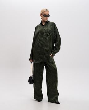 Balenciaga Зеленые брюки из шелка в принт. 681822TRLC7