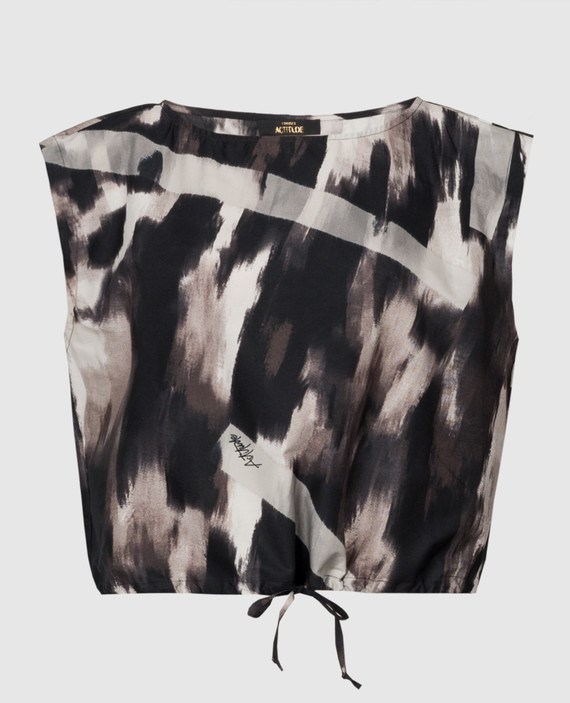 Top with ties in an abstract print