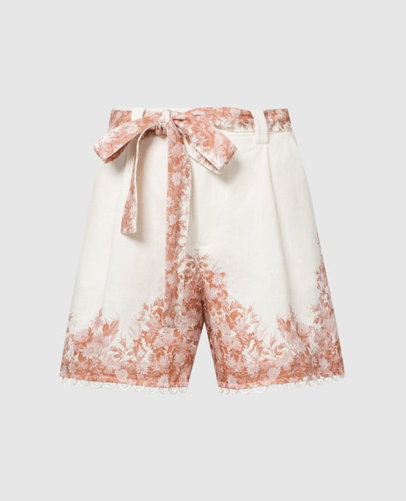 White linen shorts in a floral print