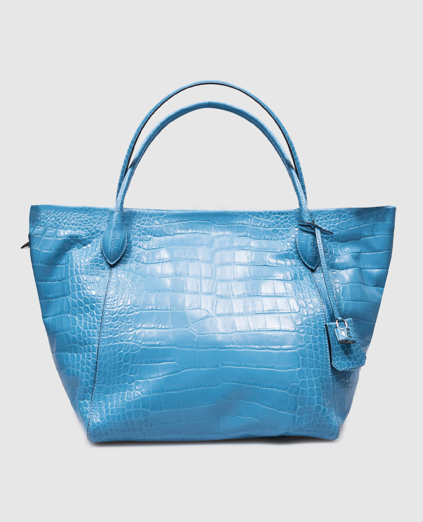 Blue leather tote bag with crocodile embossing