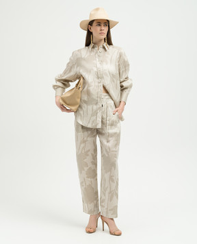 Brunello Cucinelli Бежевые брюки из льна в цветочный принт MB650P8597