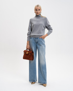 Balmain Блакитні джинси з ефектом потертості FF0MI051DF97